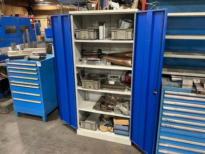 Overview picture of various spare parts & workshop machinery